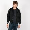 Fitted varsity jacket, wool-blend, snap closure, and artificial leather shoulder details and under collar.