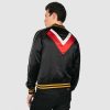 Fitted, soft satin with an eye-catching chevron pattern on the front and back. Piping on the raglan sleeves, side pockets, gun metal zipper closure, and striped elastic. Unisex sizing.