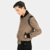 Fitted varsity jacket, wool-blend, snap closure, and artificial leather shoulder details.