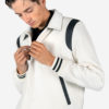 Jet. Fitted varsity jacket, wool-blend, snap closure, and artificial leather shoulder details and under collar.