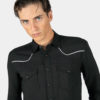 Long sleeve button up western shirt with white piping detail and snap closure.