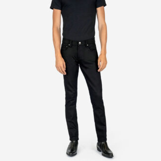 Skinny denim but not super tight with medium rise.