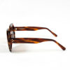 Oversized and angular shape with hand-crafted, brown Havana acetate frames.