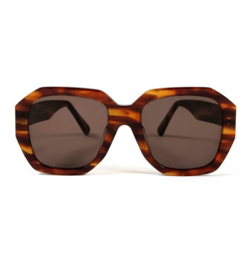 Oversized and angular shape with hand-crafted, brown Havana acetate frames.