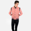 Fitted varsity jacket, vintage pink corduroy, snap closure, and artificial leather shoulder details and under collar.