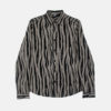 Long sleeve button up tiger striped shirt.