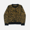 Dark yellow leopard and black knit sweater.