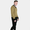 V-neck sweater with vintage-inspired yellow, tan, and black diamond pattern.