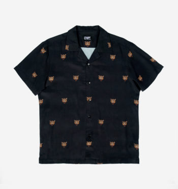 Short sleeve button up camp shirt with our Gabrielle cheetah motif and spread collar.