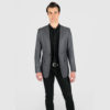 The Beat features grey shiny fabric and slim, notched lapels.
