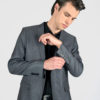 The Beat features grey shiny fabric and slim, notched lapels.