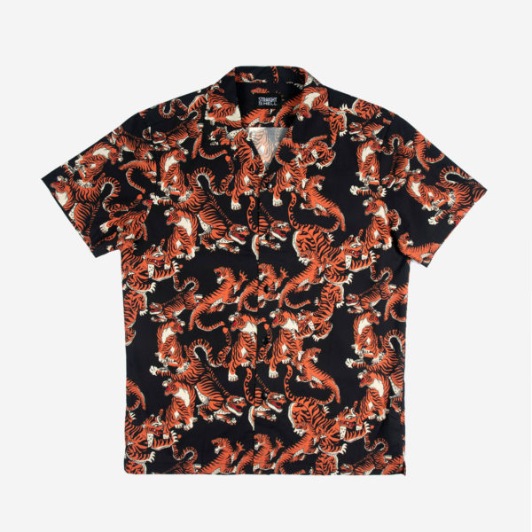 Short sleeve button up black camp shirt with spread collar featuring our tiger motif.