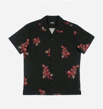 Short sleeve button up camp shirt with our roses artwork and spread collar. 