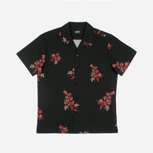 Short sleeve button up camp shirt with our roses artwork and spread collar. 