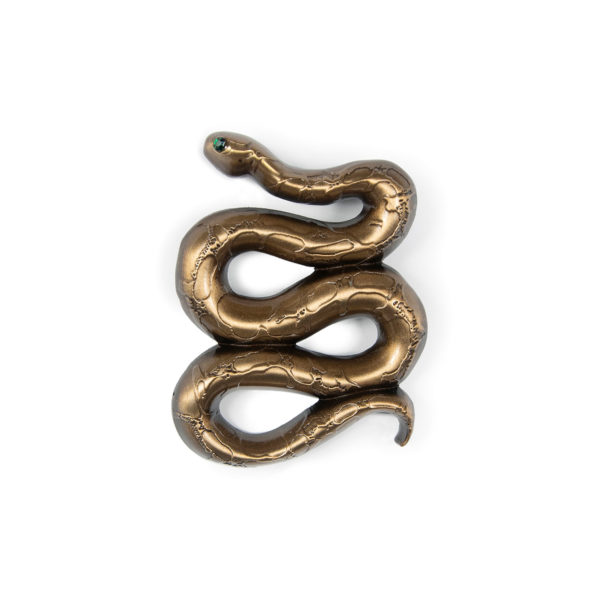 The Emerald Snake brooch features a real emerald eye on a 2 inch tall curved snake.
