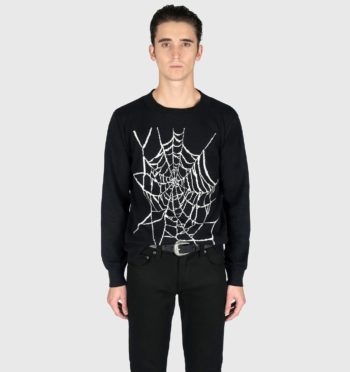 Black sweater with tall, jacquard knit spider web.