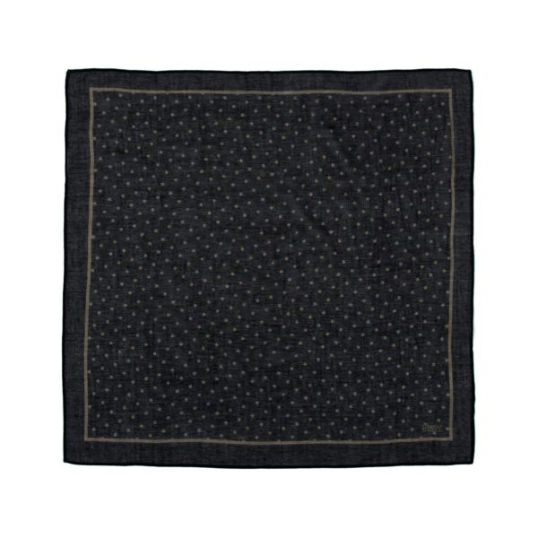 Printed scarf featuring small black and beige polka dots.