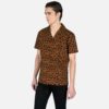 Short sleeve button up camp shirt with leopard print and spread collar.