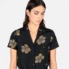 Short sleeve button up shirt with floral print and lapel collar