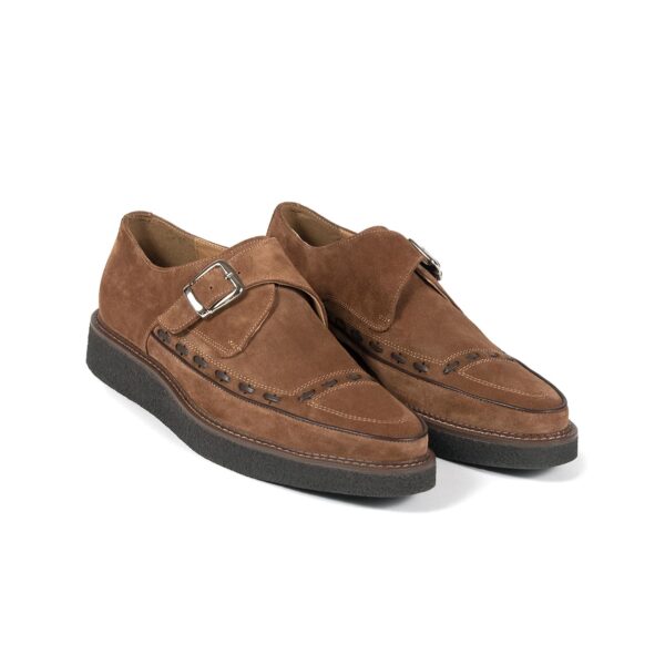 The Memphis are brown suede creepers with buckle closure.