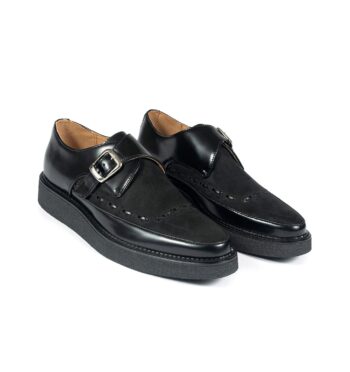 Vegan Memphis are black creepers with buckle closure.