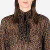 Long sleeve top with bow, featuring leopard sheer fabric