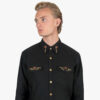 Brux – Studded Shirt (Men) The Brux features brass and gem studs along the collar, chest pockets, cuffs, and back.