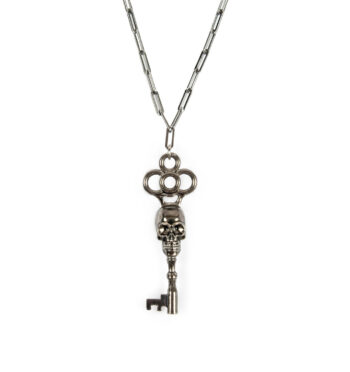 A silver-plated skeleton key necklace that hangs from a long, 18 inch stainless steel chain. The chain length can be adjusted for a shorter chain.