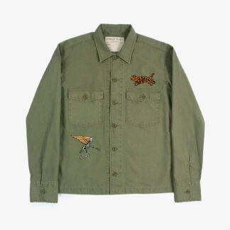 The Flying Tiger is a vintage-inspired shirt with tiger and winged skeleton embroidery and large chest pockets.
