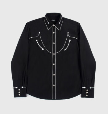 The Hillman is a black, long-sleeve western shirt. It features white piping detail, pocket arrow embroidery, and diamond snap closure.