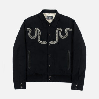 The Setting Son is an embroidered snake jacket with subtle western details and diamond snap closure.