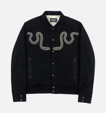 The Setting Son is an embroidered snake jacket with subtle western details and diamond snap closure.