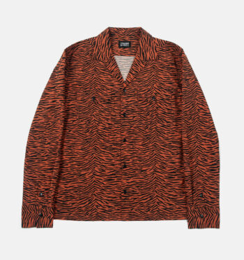 Frankie Teardrop is a long sleeve, black and burnt orange, tiger striped shirt. It features a spread collar and duel chest pockets.