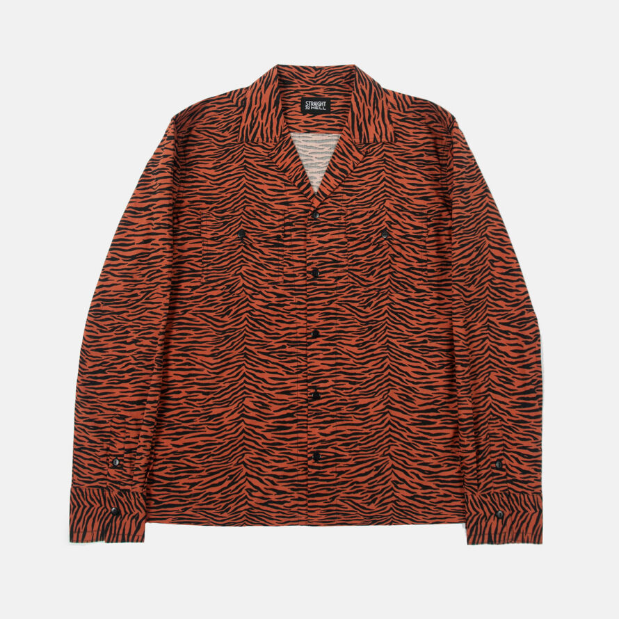 Frankie Teardrop is a long sleeve, black and burnt orange, tiger striped shirt. It features a spread collar and duel chest pockets.