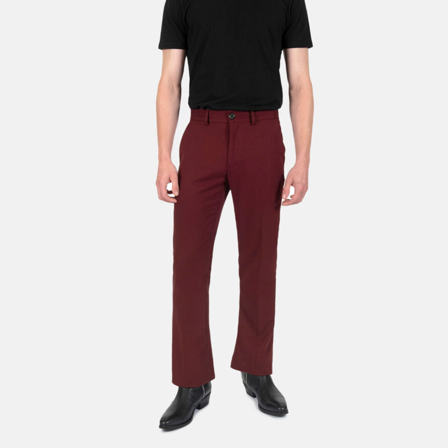 Slim fit burgundy pants with flared hem. A narrow taper from thigh to knee, and then flared from knee to the bottom. Can be worn as casual or dress pants.