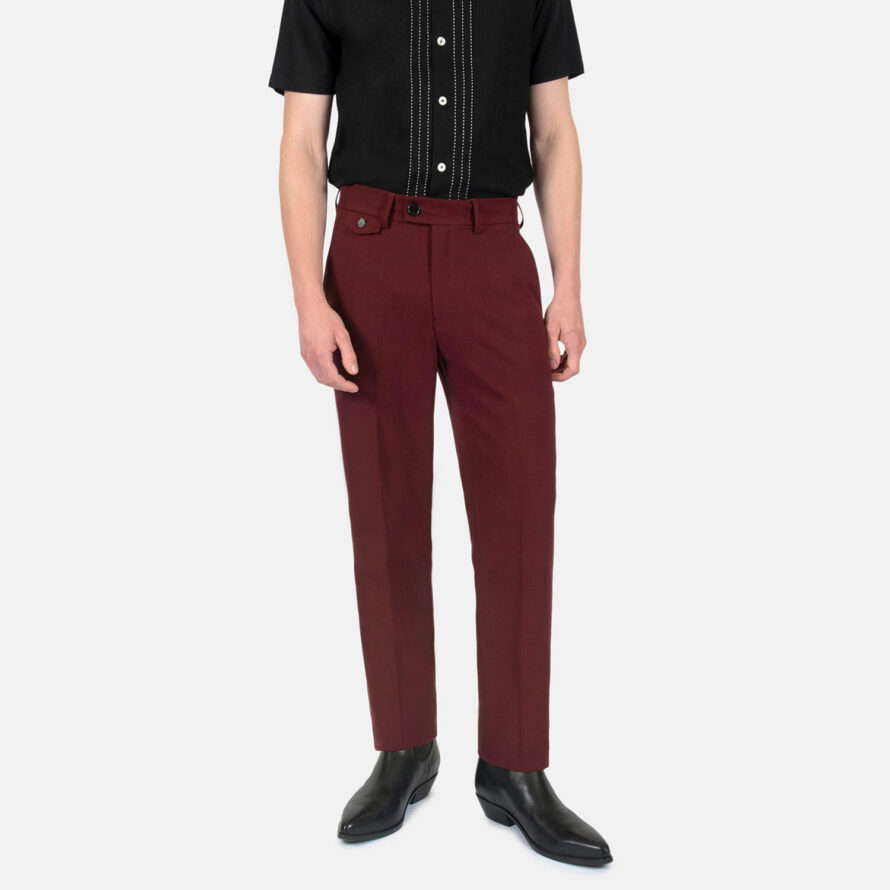Slim fit burgundy pants. Tapered from thigh to hem with room for comfort. Can be worn as casual or dress pants.