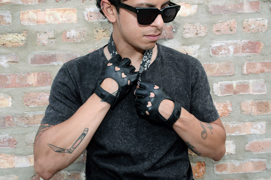 The Heartattack are men’s leather fingerless gloves with cutout hearts for knuckles. Soft leather quickly conforms to your hand’s shape.