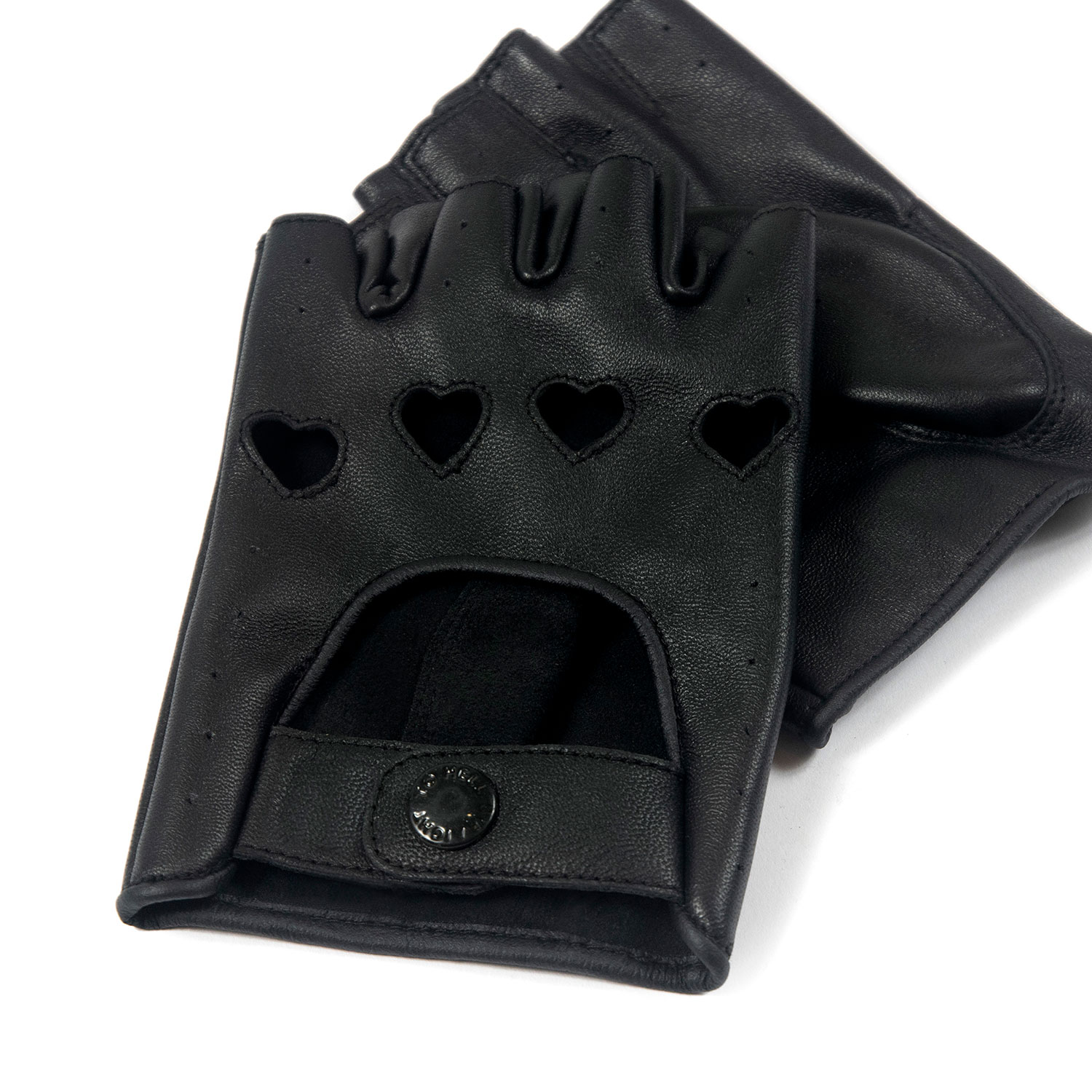 The Heartattack are men’s leather fingerless gloves with cutout hearts for knuckles. Soft leather quickly conforms to your hand’s shape.