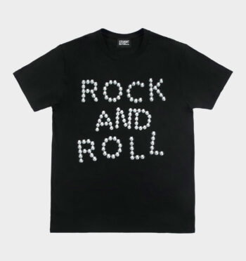 A pattern of illustrated studs comes together to spell three of our favorite words: “Rock and Roll.” Short sleeve t-shirt made from soft cotton. Printed in-house in Chicago. This is our Everyday fit.