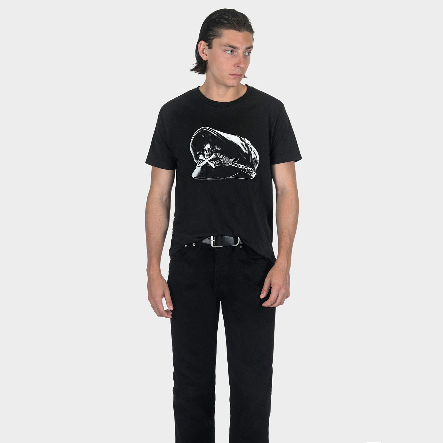 A leather motorcycle cap, done the Straight To Hell way. Short sleeve t-shirt made from soft cotton. Printed in-house in Chicago. This is our Everyday fit. If unsure of your size, email or DM so we can assist. Everyday fit: standard fit. Men can wear your usual size. Women can also wear in a unisex fit by sizing down one time. Water-based ink washes to a vintage look and feel. Printed in Chicago, Illinois, USA.