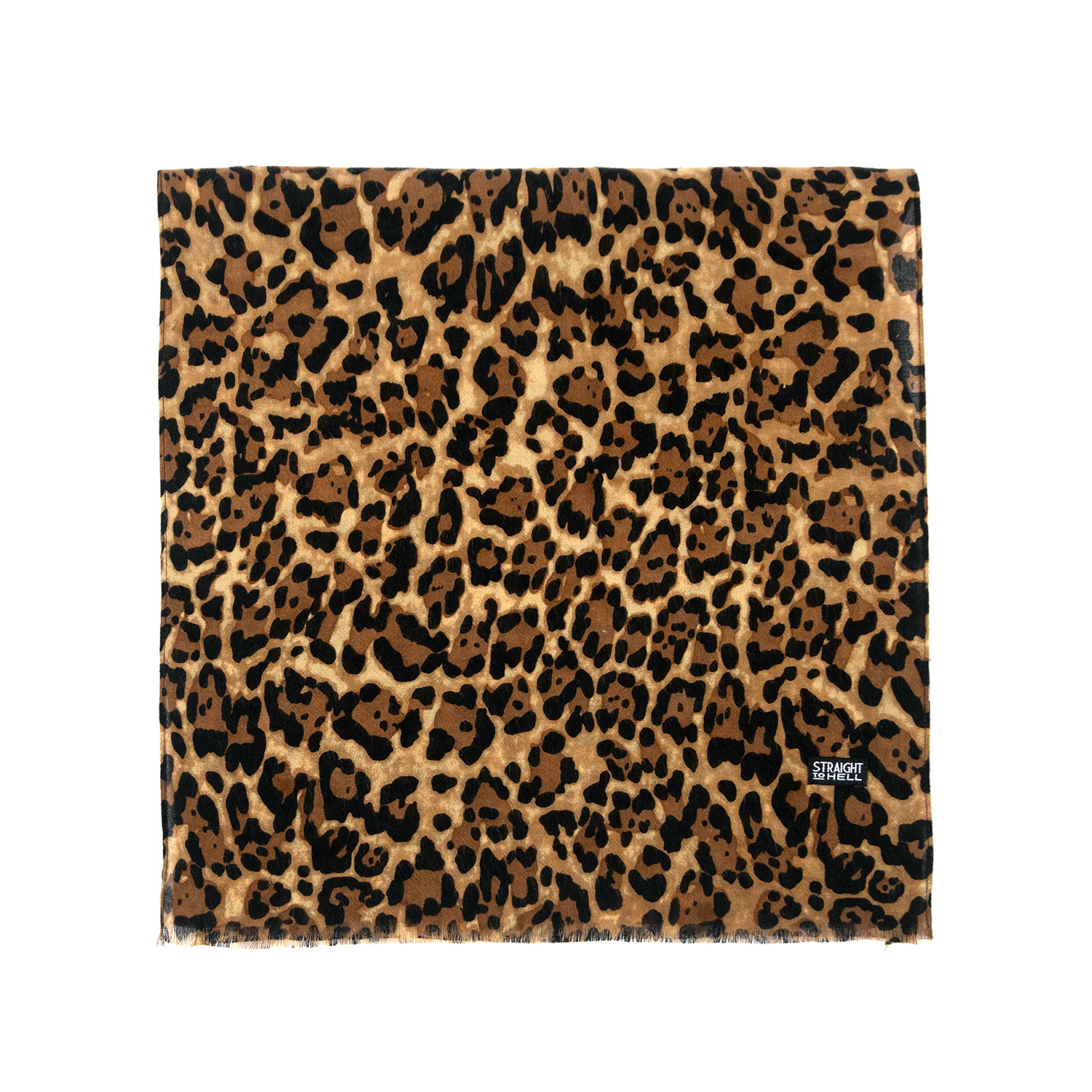 The Lux is a medium weight, leopard print scarf measuring 58 inches. Made to be worn long in front or wrapped around the neck.