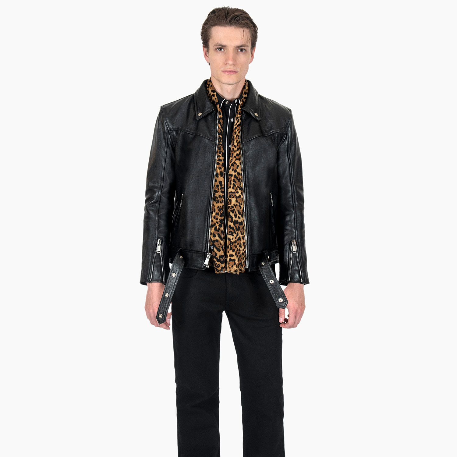 The Lux is a medium weight, leopard print scarf measuring 58 inches. Made to be worn long in front or wrapped around the neck.