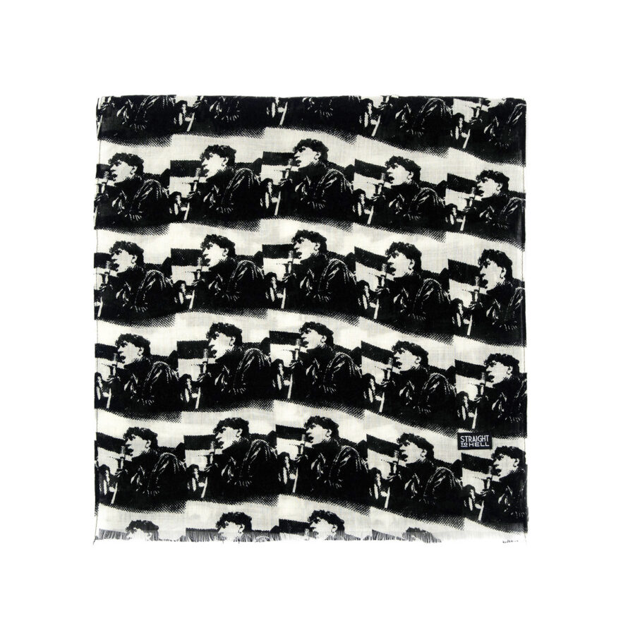 The World Was a Mess but His Hair Was Perfect scarf features a black and white image of a rock and roll singer. This is a medium weight, 58 inch long scarf. Made to be worn long in front or wrapped around the neck.
