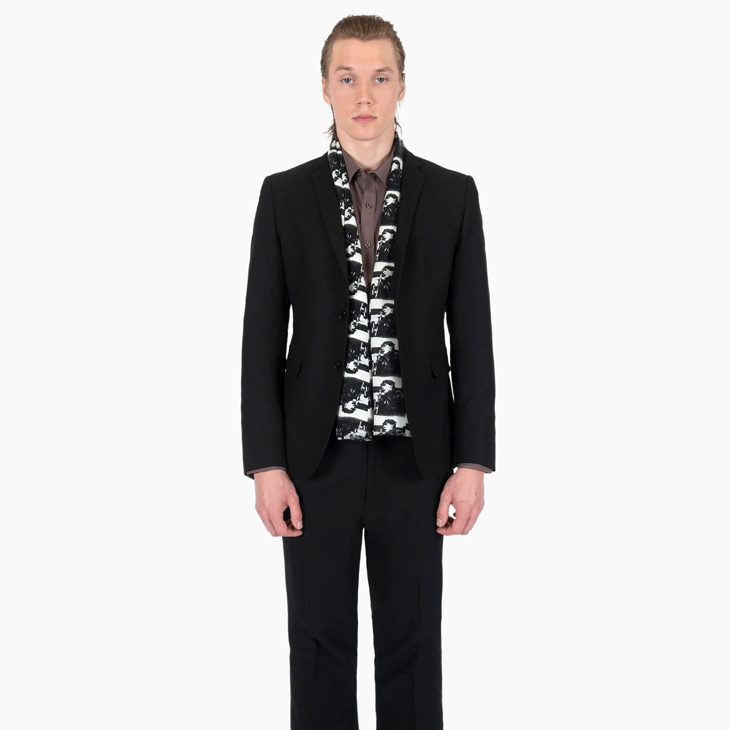 The World Was a Mess but His Hair Was Perfect scarf features a black and white image of a rock and roll singer. This is a medium weight, 58 inch long scarf. Made to be worn long in front or wrapped around the neck.