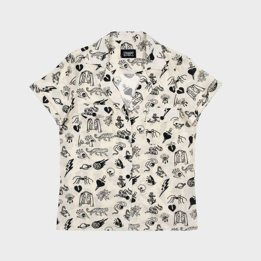 The Good Bad Not Evil shirt, filled with our doodle art. There are too many doodles to mention, but our favorites are snakes, dagger and hearts, roses, spiders, teardrop eyes, lightning bolts, cheetahs, and more. Soft cream fabric, a deep-V button up closure, dual chest pockets, and cuffed short sleeves.