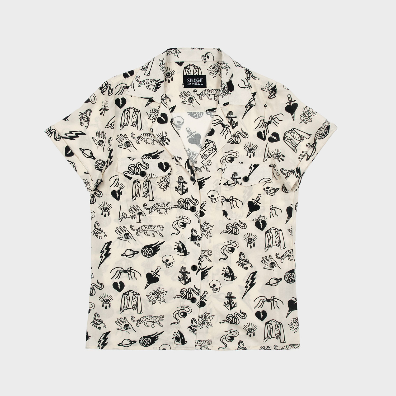 The Good Bad Not Evil shirt, filled with our doodle art. There are too many doodles to mention, but our favorites are snakes, dagger and hearts, roses, spiders, teardrop eyes, lightning bolts, cheetahs, and more. Soft cream fabric, a deep-V button up closure, dual chest pockets, and cuffed short sleeves.