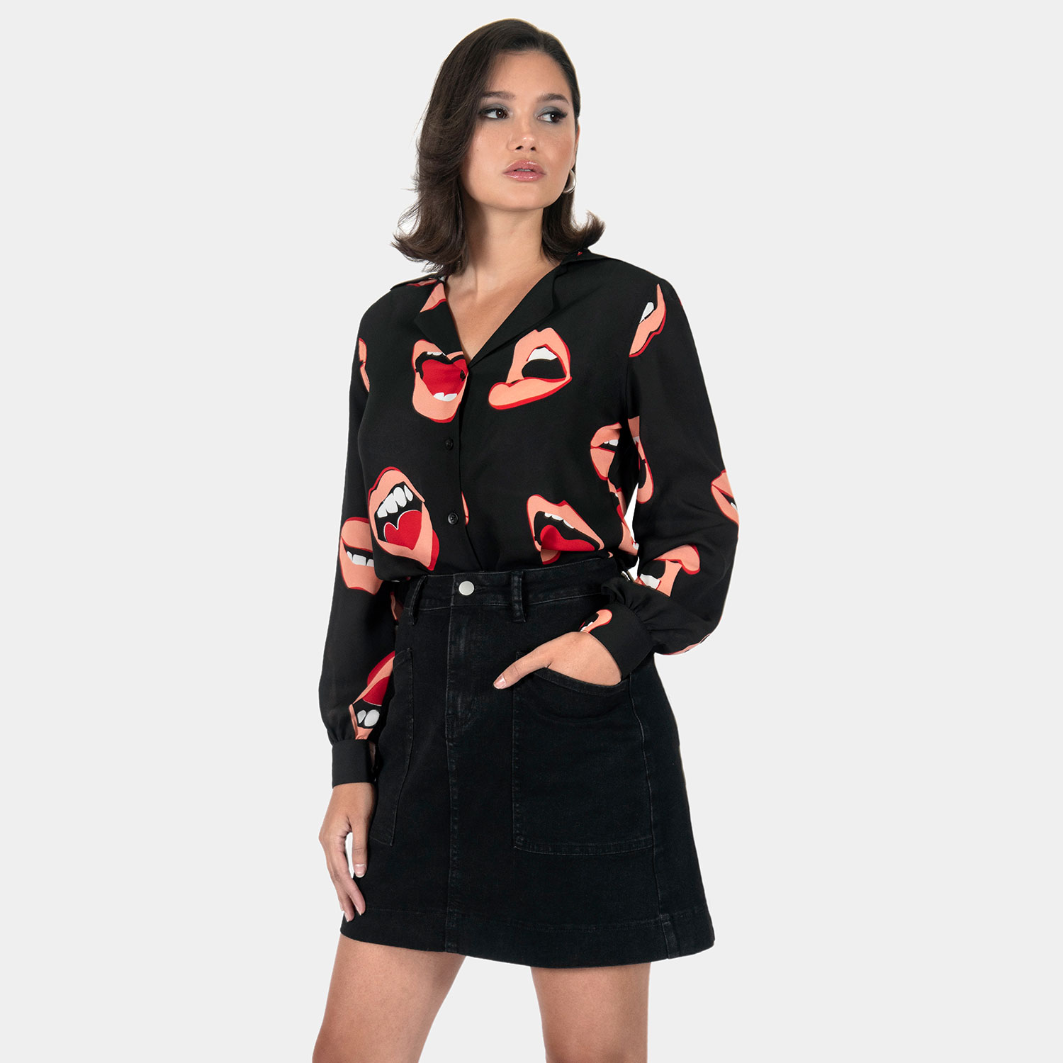 The Talk To Me long sleeve shirt, filled with retro open mouth artwork. Semi-sheer fabric meets a deep-V button-up closure and subtle balloon sleeves. This is our Casual fit.