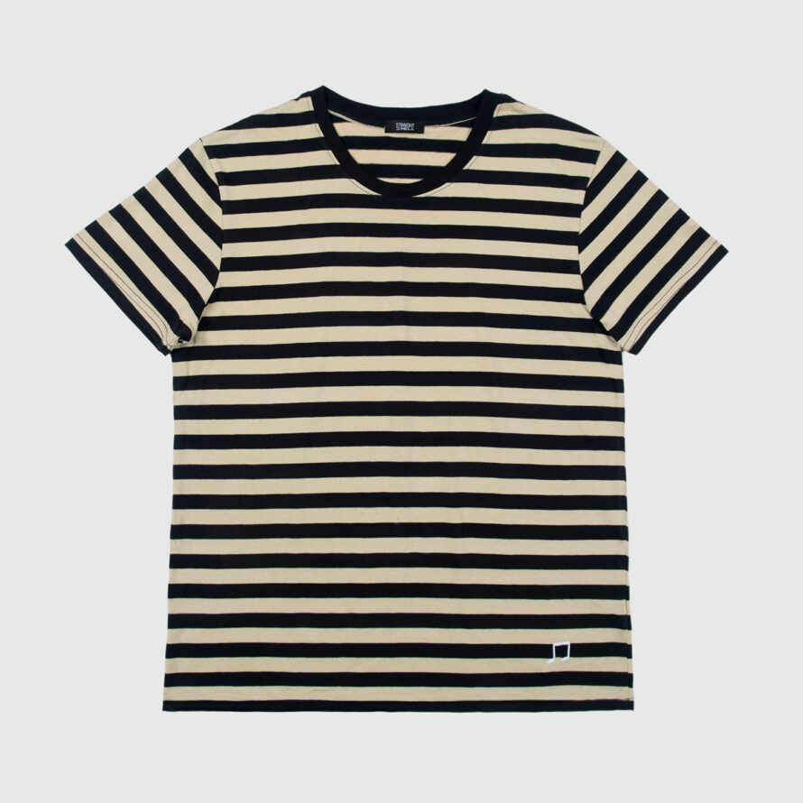 The Teddy is a black and cream, short sleeve striped t-shirt. This soft cotton-poly blend allows the fabric to drape comfortably on your torso. It features a subtle music note embroidered on the lower corner. This is our Bucktown fit.