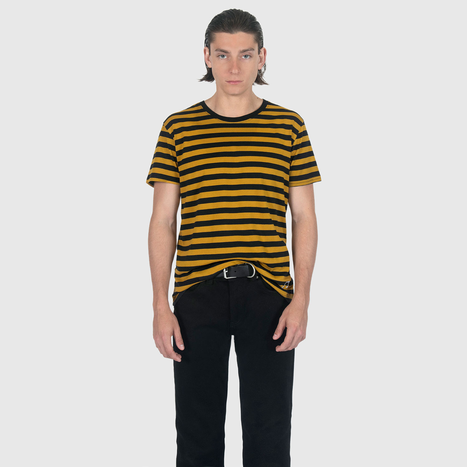 The Teddy is a black and yellow, short sleeve striped t-shirt. This soft cotton-poly blend allows the fabric to drape comfortably on your torso. This is our Bucktown fit.