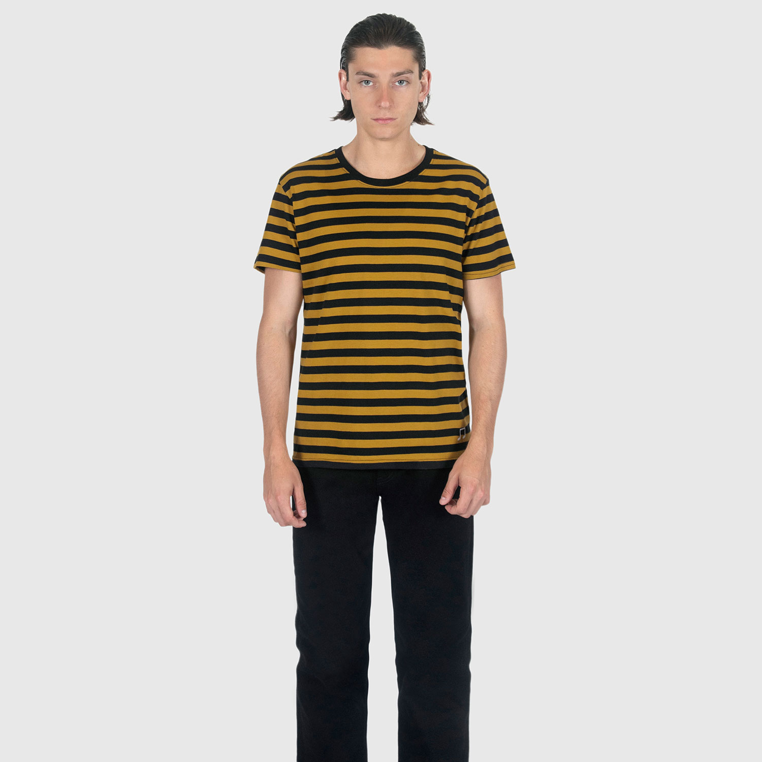 The Teddy is a black and yellow, short sleeve striped t-shirt. This soft cotton-poly blend allows the fabric to drape comfortably on your torso. This is our Bucktown fit.